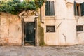 Vintage european style building facade with door and windows in Venice, Italy Royalty Free Stock Photo