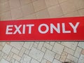 red and white exit sign,exit only sign on floor Royalty Free Stock Photo