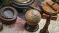 Vintage explorer\'s desk with globe and antique instruments Benjamin Banneker Week Royalty Free Stock Photo