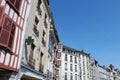 Vintage exteriors of classical french buildings on the river side of Bayonne, France