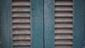 Vintage facade shutters with a layer of dust, Greece, Syros island, Ermoupoli