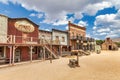 Vintage Far West town with saloon. Old wooden architecture in Wild West Royalty Free Stock Photo