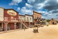 Vintage Far West town with saloon. Old wooden architecture in Wild West Royalty Free Stock Photo