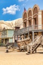 Vintage Far West town with saloon. Old wooden architecture in Wild West Royalty Free Stock Photo