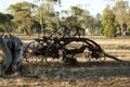 Vintage farm machinery in park Royalty Free Stock Photo