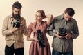 Vintage fashion concept. Men and woman on pensive faces on white background. Men in checkered clothes, retro style Royalty Free Stock Photo