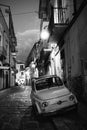 Vintage Fiat 500 car parked in old town of Foggia at night, Puglia, Italy Royalty Free Stock Photo