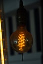 Vintage Filament Light bulb decoration made with a cheese grater Royalty Free Stock Photo