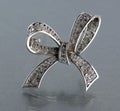 Vintage filigree silver brooch Bow Royalty Free Stock Photo