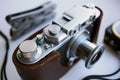 Vintage film camera in a leather case Royalty Free Stock Photo