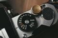 Vintage film camera, Old SLR 35mm manual camera close up on speed shutter Royalty Free Stock Photo