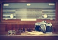 Vintage film camera and retro radio background Royalty Free Stock Photo