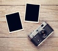 Vintage film camera and two blank photo frames Royalty Free Stock Photo