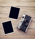 Vintage film camera and two blank photo frames Royalty Free Stock Photo