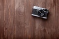 Vintage film camera on wooden table Royalty Free Stock Photo