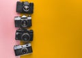 Vintage Film Cameras On Yellow And Pink Background. Creativity Retro Technology Concept Royalty Free Stock Photo