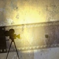 Vintage film strip background and old cinecamera Royalty Free Stock Photo