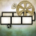 Vintage film strip background with reels Royalty Free Stock Photo