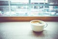 Vintage filter :Close up Espresso Coffee cup on wood table in ca Royalty Free Stock Photo