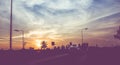 Vintage filtered : silhouette landscape of cars on road,sunset s Royalty Free Stock Photo