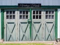 Vintage Finds Sign Above Old Country Barn Doors