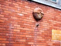 Vintage fire alarm on brick building