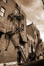 Vintage fire escape on brick building