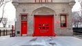 Vintage Firehouse in City bright red Doors & Brick wall Royalty Free Stock Photo