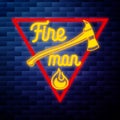 Vintage fireman emblem glowing neon Royalty Free Stock Photo