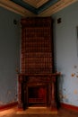 Vintage fireplace in living room of abandoned palace