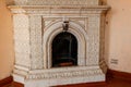 Vintage fireplace in living room of abandoned palace Royalty Free Stock Photo