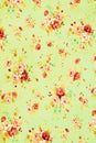 Vintage floral fabric, Fragment of colorful retro tapestry textile pattern with floral ornament useful as background Royalty Free Stock Photo