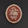 vintage flower cameo brooch on a black background Royalty Free Stock Photo