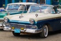 Vintage Ford and Chevrolet cars parked at the street in Havana, Cuba. Royalty Free Stock Photo