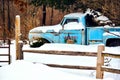 Vintage Ford Teal Truck in Snow