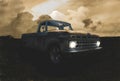 Saint Clair Shores, Michigan / USA - September 22-2020:Vintage Ford Truck running while thunder clouds move in Royalty Free Stock Photo