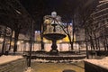 Vintage fountain in the little park near the Golden Gate at winter night. Kyiv, Ukraine Royalty Free Stock Photo