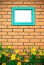 Vintage frame on brick wall with flower