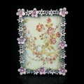 Vintage frame with floral ornament on black background. Royalty Free Stock Photo