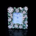 Vintage frame with floral ornament on black background. Royalty Free Stock Photo