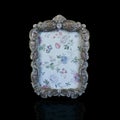 Vintage frame with floral ornament on black background. Royalty Free Stock Photo