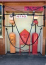 Vintage Fuel pumps and Shell signs at retro gas station