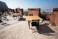 Vintage furniture in rooftop cafe under the Fort