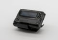 Black pager isolated on the white background. Royalty Free Stock Photo