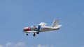 Vintage general aviation private airplane in flight in blue sky. Copy space.