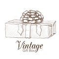 Vintage gift box hand drawn. engraved present illustration isolated on white background. present box icon with lush bow Royalty Free Stock Photo