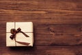 Vintage gift over wooden background Royalty Free Stock Photo