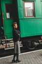 Girl says goodbye on rail platform Royalty Free Stock Photo