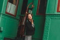 Girl says goodbye on rail platform Royalty Free Stock Photo