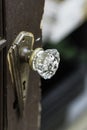 Vintage glass doorknob with skeleton keyhole Royalty Free Stock Photo